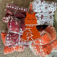Ensemble uniforme scolaire athlétique personnalisé DH ODM : Haut sans manches à nœud triple gingham et bordure festonnée avec short intégré