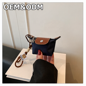 Borsa <span class=keywords><strong>Mini</strong></span> Dumpling in Tessuto Oxford con Cerniera Decorata e Chiusura Magnetica per Donne, Uso Quotidiano e Feste, Prodotta in Cina - Product Image 1