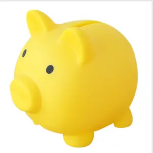 一只可爱的小猪形状的储蓄罐硬币银行存钱