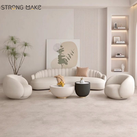 Canapé sectionnel incurvé blanc, style scandinave moderne et luxueux, idéal pour salon, hall d'hôtel ou petit appartement.