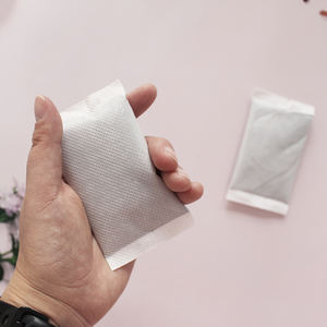 Sachets de poche à chaleur instantanée pour mains chaudes activés par l'air CE ISO MSDS Patch auto-chauffant jetable Coussin chauffant adhésif Chauffe-mains - Product Image 5