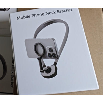 Neck phone holder with magnetic ring