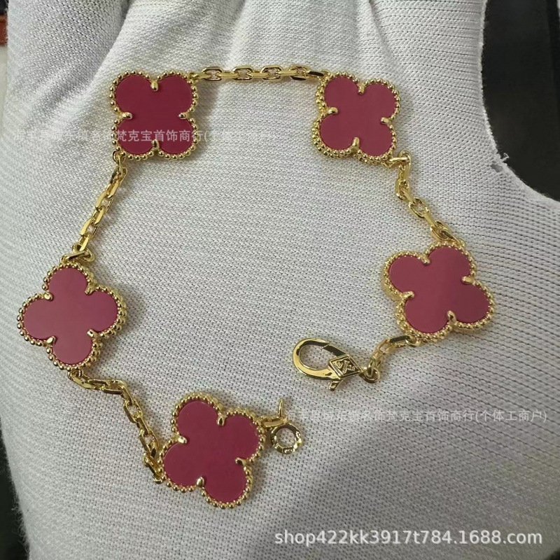 Bracelet cinq fleurs rouge prune doré