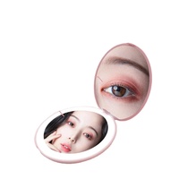 Vente en gros de poche miroir cosmétique LED avec lumière miroir grossissant 2X miroir lumineux LED miroir de maquillage portable