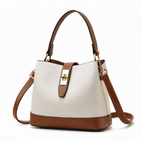 Sac à main seau portable en cuir PU bicolore avec fermeture à bouton, sac à bandoulière pour femme, sac à main tendance pour les voyages quotidiens