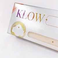 Boîte haut de gamme personnalisée avec plateau, logo gaufré coloré et brillant, emballage portable et simple pour stylo, finition brillante pour un envoi facile.