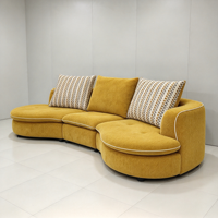 Canapé de salon populaire pour grande villa, ensemble de canapés modernes et élégants en tissu nuage pour usage domestique, nouveau canapé incurvé créatif de designer
