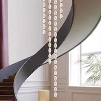 Lustre long moderne en forme de collier de boules de cristal, design nordique, pour escalier, salle à manger, villa, décoration artistique