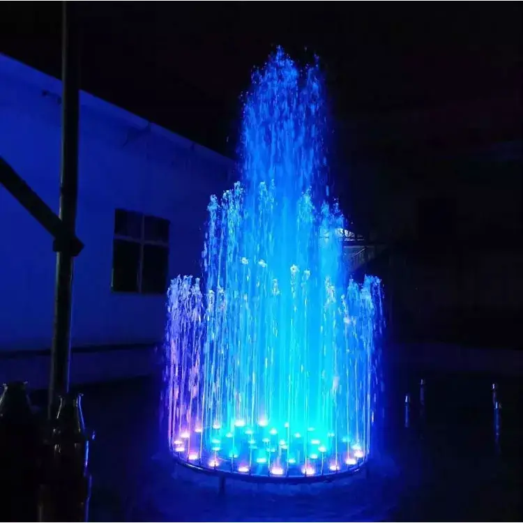 Mini fontana di acqua danzante di musica dell'interno all'aperto del giardino con le luci principali