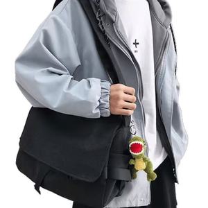 Bandolera de hombro de lona minimalista unisex, diseño de transporte doble informal - Product Image 1