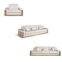 Ensemble de canapés de luxe moderne sur mesure 1+3 places en tissu avec table d'appoint intégrée pour villa et salon de direction