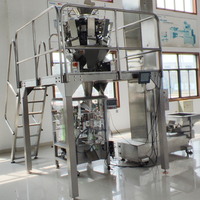 Machine d'emballage verticale automatique multifonctionnelle avec peseuse 10/14 têtes pour sachets, produits soufflés, aliments sous azote, noix, chips, riz