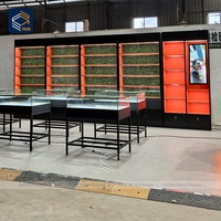 Kustom eceran Unit pajangan dinding Panel belakang Merah tanaman hijau buatan latar belakang kabinet pajangan pencahayaan LED