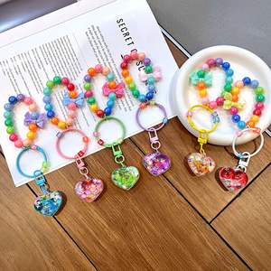 Porte-clés personnalisé avec perles et paillettes liquides, cœur et nœud arc-en-ciel, sangle de téléphone Kawaii pour filles, cadeau d'anniversaire pour adolescentes, vente en gros - Product Image 4