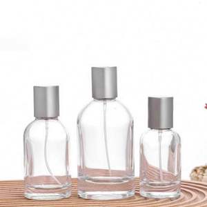 Flacons de parfum en verre transparent ronds personnalisés, vides, 30 ml, 50 ml, 100 ml, avec pulvérisateur et impression sérigraphique - Product Image 2