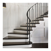 Escalier incurvé décoratif moderne avec marches en pierre artificielle pour appartement