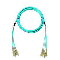 LSZH bahan 5.0mm Diameter luar lapis baja multifode 4-core 10G serat optik Jumper LC/SC/FC/ST