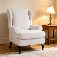 Fauteuil d'appoint moderne à dossier haut en velours côtelé gaufré crème, avec pieds en métal noir courbés, pour salon