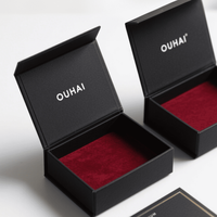 Vente en gros de boîte-cadeau de luxe pliable magnétique vêtements emballage carton gris boîte-cadeau magnétique noire avec ruban logo personnalisé