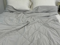 Couverture rafraîchissante tricotée OEM QMAX 4.0 Cozy Bliss, respirante, douce, légère, soyeuse, pour toutes les saisons, en nylon/spandex