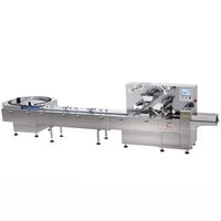 Machine automatique de découpe et d'emballage de bonbons gélifiés en forme de coussinets de sucre