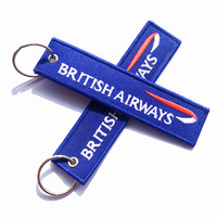 Porte-clés d'étiquette d'aviation d'avion en PVC personnalisé en gros porte-clés brodé personnalisé avec instruction «Remove You Fly»