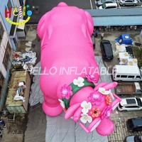 Modèle de vache gonflable géante rose, mascotte mignonne de dessin animé avec lunettes et fleurs pour événements sur le thème de la ferme et la publicité