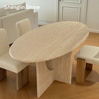 Table à manger ovale en travertin beige naturel, base découpée artistiquement, fabrication directe usine OEM ODM, pour salle à manger de villa moderne