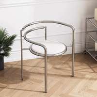 Chaise de salle à manger de style moderne du milieu du siècle pour bureau à domicile |   Fauteuil minimaliste italien en acier inoxydable avec dossier design
