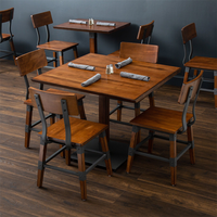 Tables et chaises en bois de style industriel européen pour restaurants et cafés pour les clients et les propriétaires de cafés