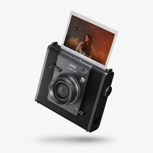 Appareil photo instantané hybride Fujifilm <span class=keywords><strong>Instax</strong></span> <span class=keywords><strong>Mini</strong></span> <span class=keywords><strong>Evo</strong></span> Cinema avec viseur, poignée, sangle de transport, album, trépied et carte mémoire 32 Go - Product Image 3