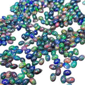 Ópalo Negro Natural Etíope en Piedra Suelta con Forma de Huevo, Buen Fuego de Color, Base Plana y Superficie Lisa Tratado Térmicamente - Product Image 5