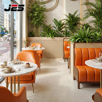 Bancs de restaurant commerciaux personnalisés J2S avec tables rondes et chaises pour les projets de design d'intérieur de cafés