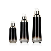 Flacon cosmétique rond en verre noir Noir-Luxe 40ml 100ml avec estampage à chaud doré pour sérum et brume de soin à la vitamine E