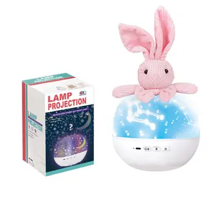 Sıcak satış karikatür tavşan bebek projeksiyon ışığı (Plug-in müzik döner model) duyusal oyuncaklar bebek dönen yıldız projektör lambası
