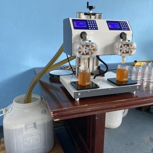 Nouvel équipement apicole 2023 : Machine de remplissage de miel à deux têtes pour bouteilles - Product Image 5