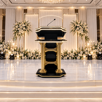 Pupitre de conférence noir et or brillant avec étagères de rangement pour réceptions de mariage, banquets d'hôtel et événements