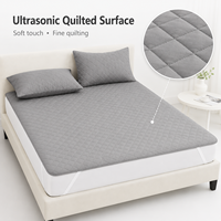 Drap plat matelassé imperméable à ultrasons pratique, anti-déversement, acceptant les commandes en gros et l'emballage personnalisé