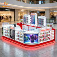Présentoir d'îlot pour coques de téléphone écologiques avec étagères éclairées par LED, conception de kiosque de réparation de téléphones portables
