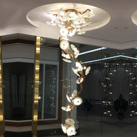 Lustre LED moderne en cristal avec pendentif en cuivre personnalisé IAN pour salle à manger, projet hôtelier, escalier, double plafond
