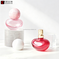 Bouteille de parfum capillaire rose personnalisée de 15ml Bouteille de pulvérisation cosmétique avec pompe et pendentif Bouteille de soin de la peau à bas prix Emballage cosmétique