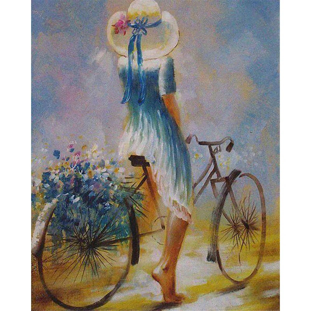 Femme chevauchant une bicyclette