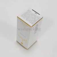 Boîte d'emballage en papier de luxe en carton blanc personnalisé avec insert coloré pour bouteille de parfum en verre
