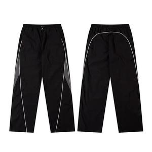 <span class=keywords><strong>Pantalon</strong></span> de <span class=keywords><strong>jogging</strong></span> en nylon léger et personnalisable pour homme, coupe droite, style urbain, avec grandes poches, idéal pour le sport et le travail - Product Image 2