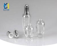 Flacon compte-gouttes en verre de conception fantaisie en gros pour huile essentielle 30ml compte-gouttes à bouton-poussoir 50ml flacon compte-gouttes