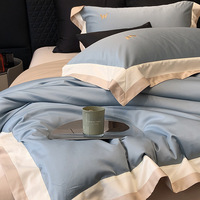 Parure de lit de luxe haut de gamme 100S double épaisseur personnalisable quatre pièces avec broderie simple, housse de couette et drap-housse