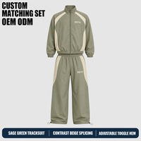 Survêtements Verts Personnalisés pour Hommes – Coupe-Vent en Nylon avec Patchwork, Col Montant, Fermeture Éclair Intégrale, Pantalon Ample à Jambes Larges pour Sports Décontractés