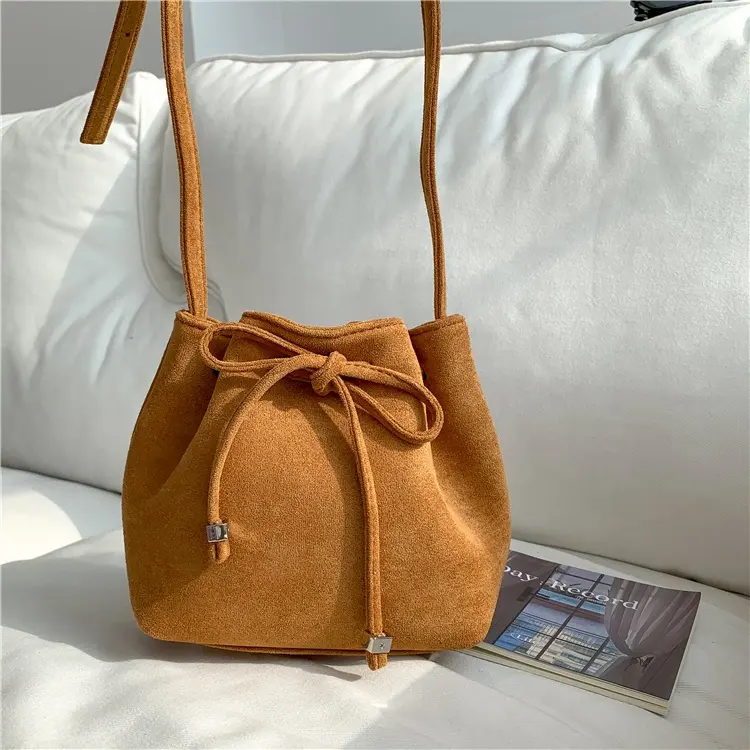 New Drawstring fold shoulder bags for women Fashion plain vintage bag South Korean style bucket bag plush small crossbody