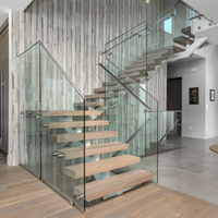 Escalier préfabriqué à poutre centrale simple en forme de L, sur mesure pour appartement et loft