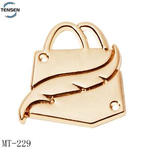 Etichetta in metallo per Bikini personalizzata con Logo Abaya goffrato 2 fori per abbigliamento in lega di zinco distintivo per cucire Logo in oro per capi sciarpa - Product Image 1